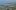 Panoramablick auf Konstanz am Bodensee mit Seerhein, Altstadt, Münster und mehreren Brücken, im Hintergrund die Schweizer Uferlandschaft.